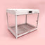 Modern transparent pet cabin with digital control on pink background, ideal for cat boarding